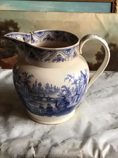 19th Century Blue and White Transfer Printed Jug with lovely old repair with sta