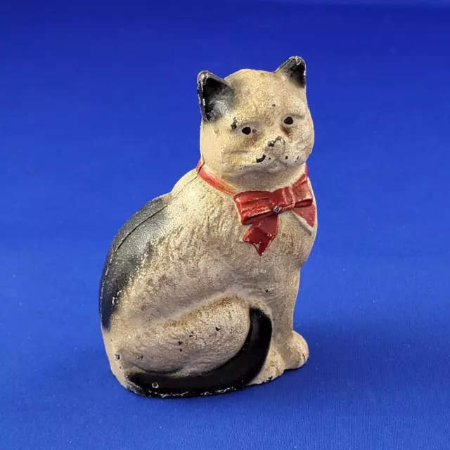 Cast Iron Sitting CAT with Red Bow & Black Eyes Still Penny Coin Bank