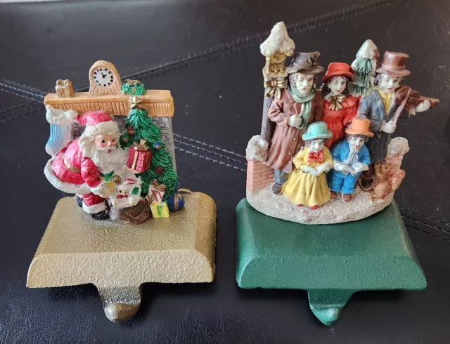 Two Vtg Cast-iron Stocking Holders. Santa Placing Presents and The Carolers.