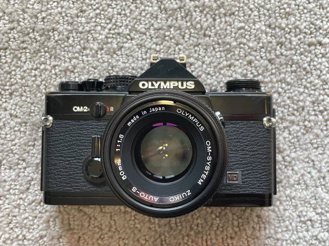 OLYMPUS OM-2N + 50mm F1.8 LENS in WORKING ORDER BUT GRUBBY
