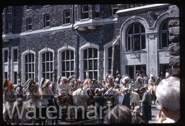 1950s  red kodachrome photo slide Banff Canada   Indian Photographer with Camera