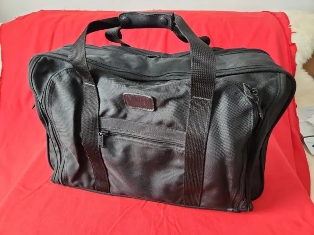 Tumi Weekend Bag Unused- Lots of Compartments and Pockets
