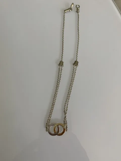 Movado Sterling Silver 18k Gold Diamond Infinity Pendant Necklace.