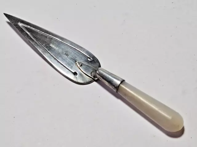 NOVELTY SILVER BOOKMARK - TROWEL, MOTHER OF PEARL HANDLE, Ari D Norman 1999