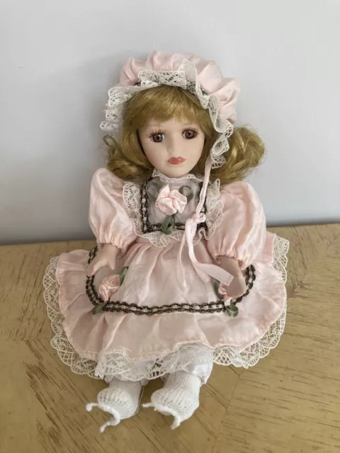 Porcelain Doll Sitting, Good Condition