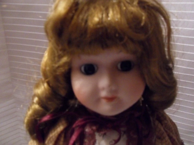 vintage porcelain heritage doll 16 inches tall.  