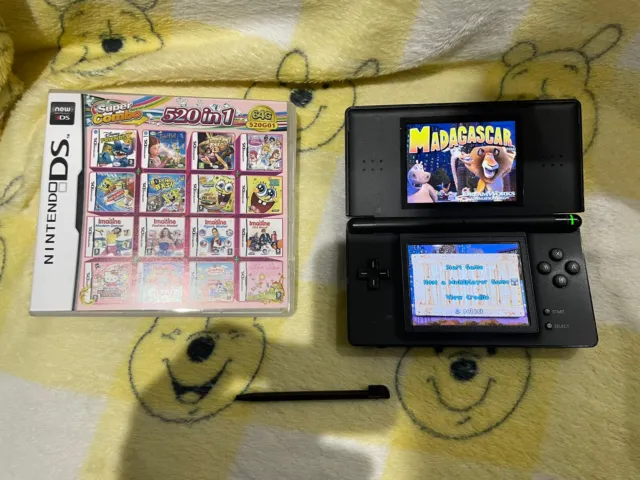 Nintendo DS Lite Portable Handheld Gaming Console with 520 game cartridge.