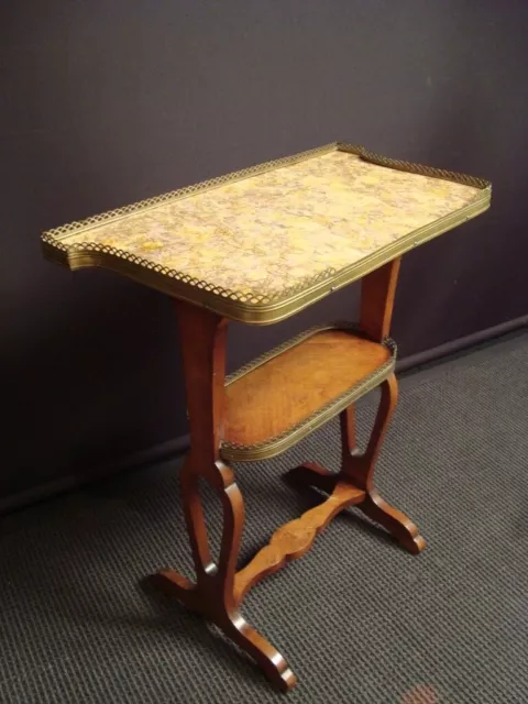 A marble topped kingwood veneered work table