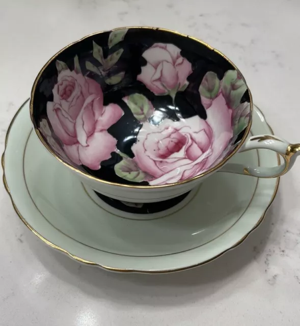 PARAGON 1950's TEACUP & SAUCER W/ PINK ROSES ON BLACK W/ GOLD FLOATING ROSE