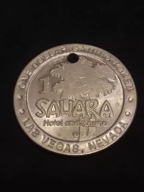 Sahara Hotel & Casino Las Vegas Nevada One Dollar Gaming Token, Holed