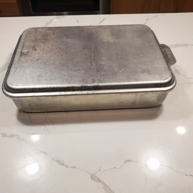 https://www.picclickimg.com/~XUAAOSw26FlE5IL/Vtg-MIRRO-Aluminum-Cake-Pan-with-Slide-on.webp
