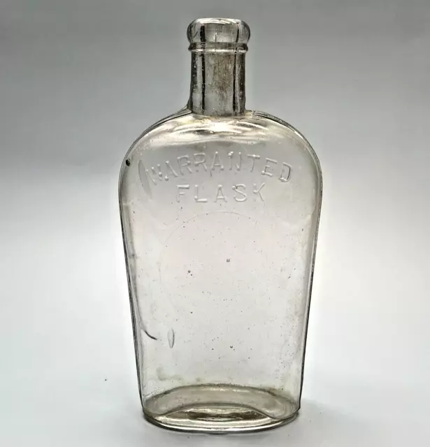 NICE! ANTIQUE EMBOSSED GLASS WARRANTED FLASK BOTTLE   8” tall
