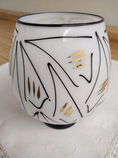 Vtg. MCM white glass fish bowl footed vase w/raised black and gold design.