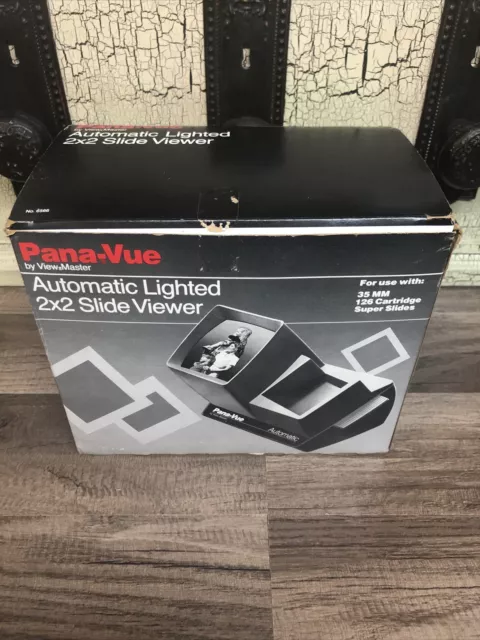 Visor de diapositivas Pana-Vue iluminado automático 2x2 para 35 mm