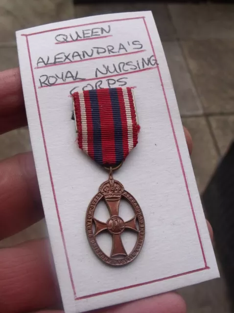 Miniature Queen Alexandra's Imperial Military Nursing Service Cape Badge Medal.