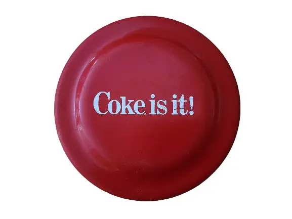 COKE IS IT! Coca-Cola Fun Flyer Junior Frisbee / Flying Disc Advertisement 1980s