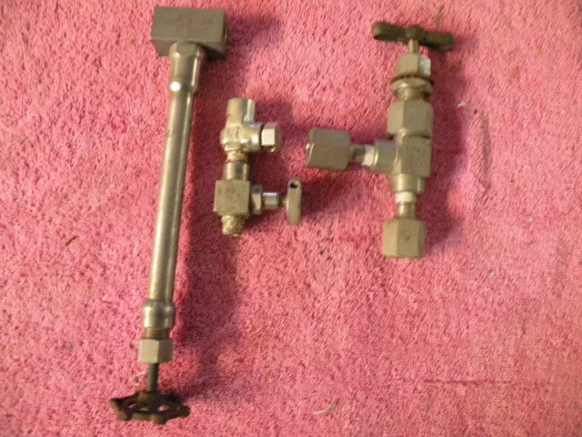 1/4 inch stainless needle valves-- lot of 3 --and some fittings --as pictured -