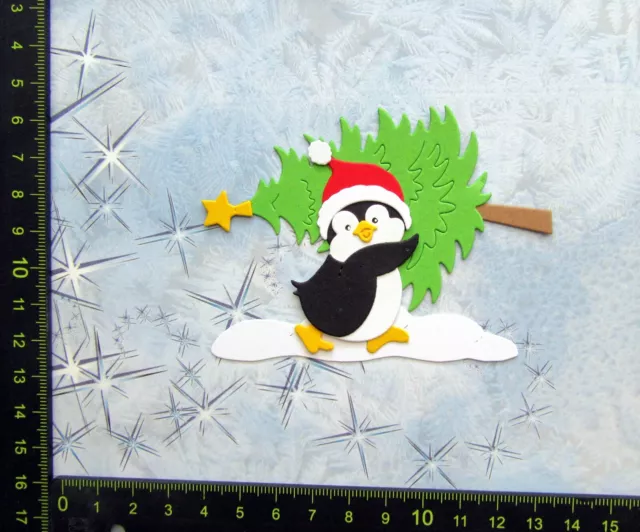 Stanzteile Kartenschmuck Scrapbooking Weihnachten lustiger Pinguin bringt Baum