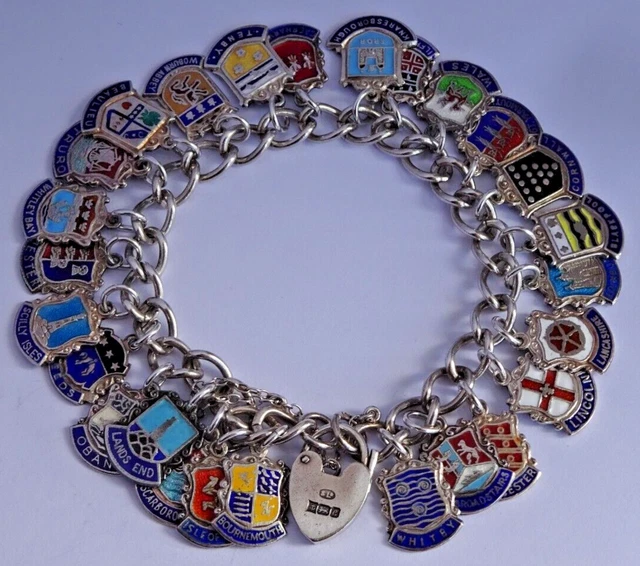 Lovely solid silver vintage charm bracelet, 26 silver & enamel uK travel shields Lovely solid silver vintage charm bracelet, 26 silver & enamel uK travel shields