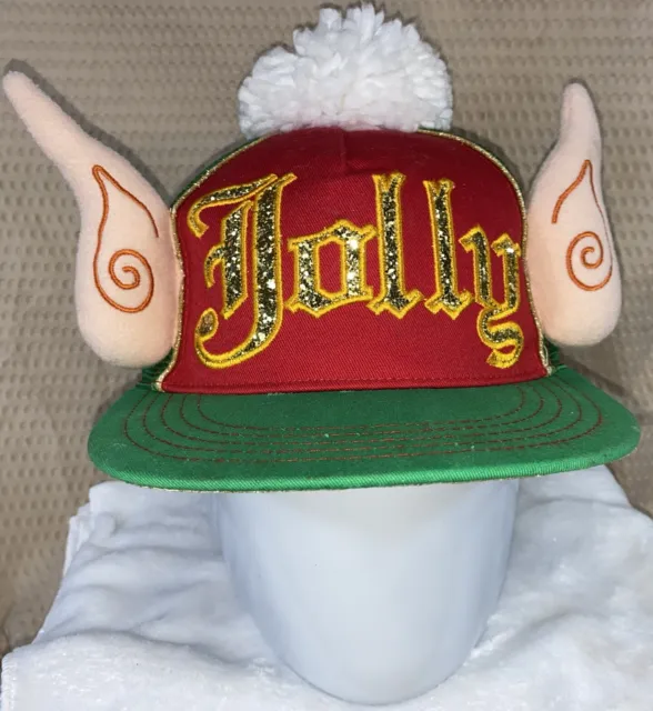 MixIt “Jolly” Green & Red Elf w/ Ears & Pom SnapBack Truckers Christmas Cap Hat