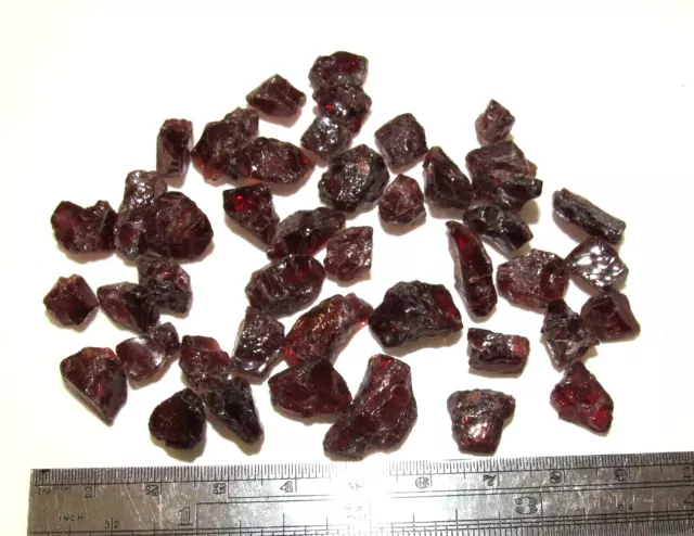 Garnet orange/red cab rough. 211ct, Fiery colour. UK 2