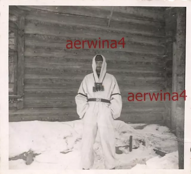 German soldier with binoculars in winter camouflage winter 42 Reschev Russia Eastern Front