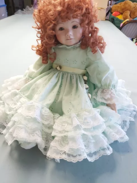 Beautiful Auburn-haired Porcelain Doll In Green Lace Dress