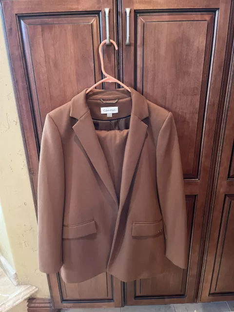 Women's Calvin Klein  2 pc suit, brown.  Lined Jacket size 10,  pants size 12