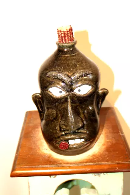 wayne hewell  face jug, pottery, folk art  10''x 7''