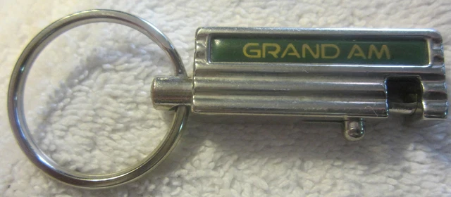 1 Vintage Pontiac Grand Am car spring loaded ad auto keychain,rare