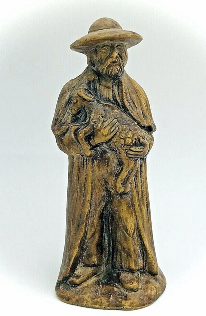 Sujet en plâtre imitant le bois berger portant son agneau pâtre