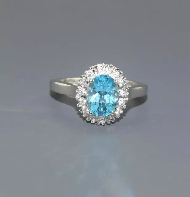 A Pretty Silver Blue Topaz & Diamond Cluster Ring with Valuation