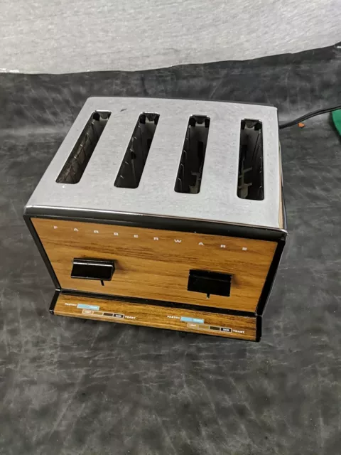 https://www.picclickimg.com/~fsAAOSweY1lNrHx/Vtg-Farberware-Toaster-4-Slice-Chrome-Wood-Grain-Model.webp