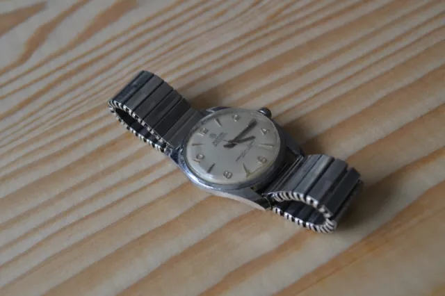 Ancienne montre Mortima mécanique française en acier vintage 43 MM