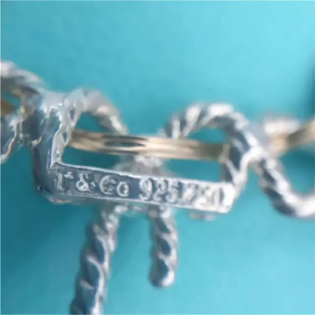 Tiffany & Co. Collier pendentif ruban triple torsion en argent 925 or 18 carats 2