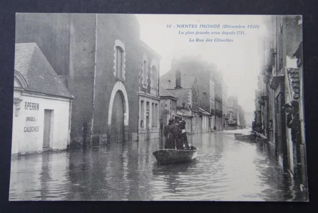 CPA Carte postale NANTES inondé 1910 Rue des olivettes commerce PERRIN bride