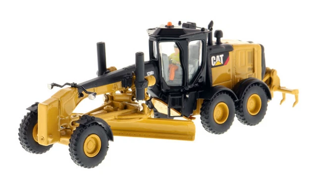 CATERPILLAR 374DL accompagnée d'une figurine et d'une boite en métal