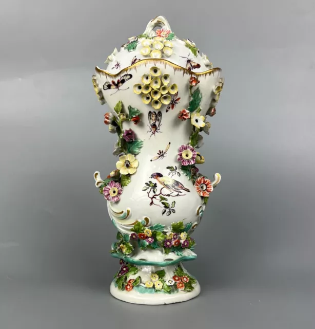 A rare Chelsea (c.1760) rococo frill vase & cover painted w/ birds and insects.