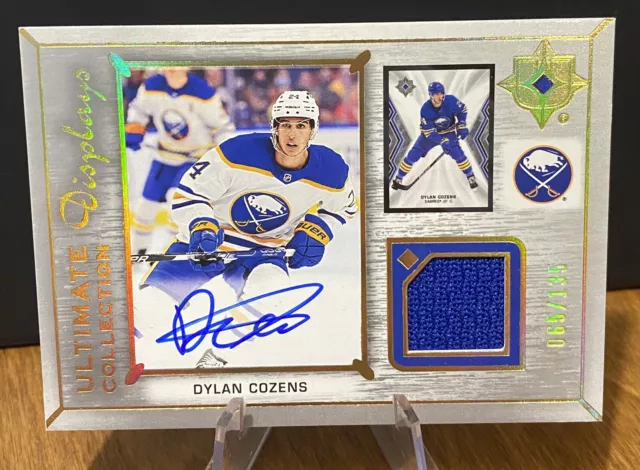 2021-22 UD Ultimate Collection Displays Dylan Cozens Jersey Patch Auto /135