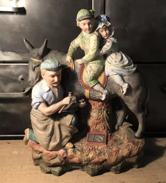 Statuette En Biscuit Groupe Polychrome Maréchal Ferrant Âne H 27,3 Cm