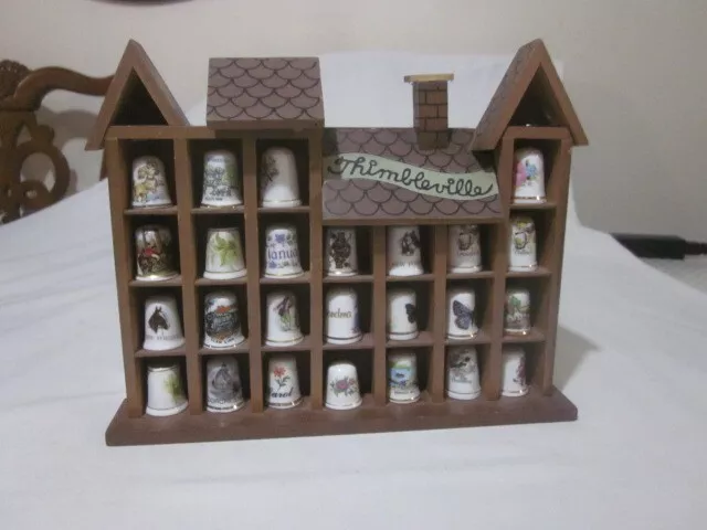 thimbles with wooden display case nice lovely collection used