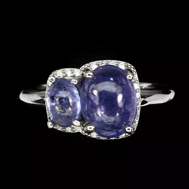 Belle Bague en  argent massif 925 et vrai  Tanzanite et Zircons