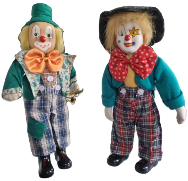 Two porcelain headed clowns. Very good condition.