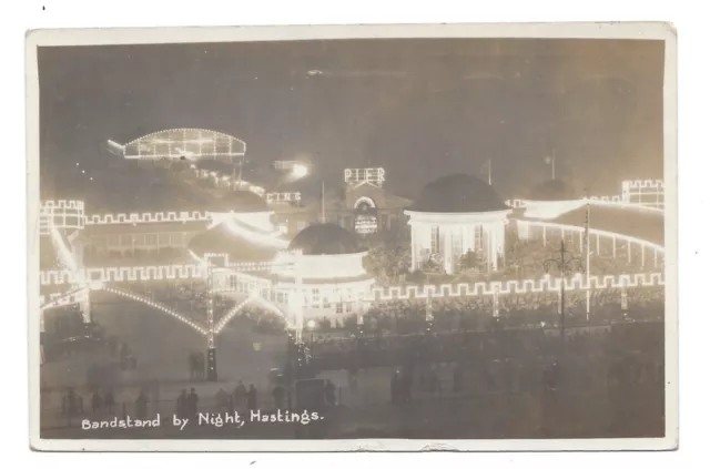 Vintage RP postcard Bandstand by Night, Hastings, Sussex. pmk Palmers Green 1925