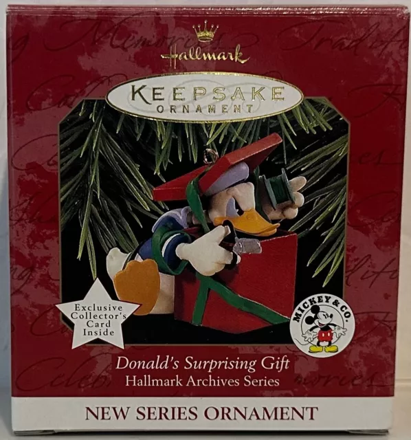 1997 Hallmark Donald's Surprising Gift Handcrafted Keepsake Ornament