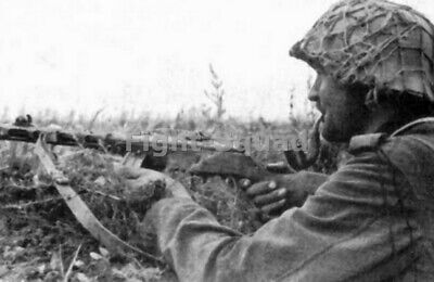 WW2 Picture Photo German soldier with a captured PPSh-41 submachine gun 1283
