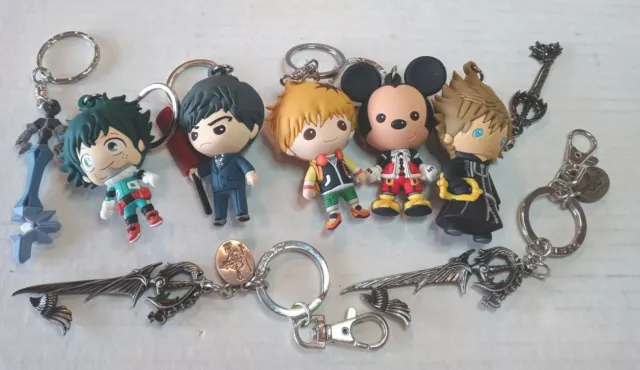 Mixed lot of 8 Disney Kingdom Hearts Keychains.