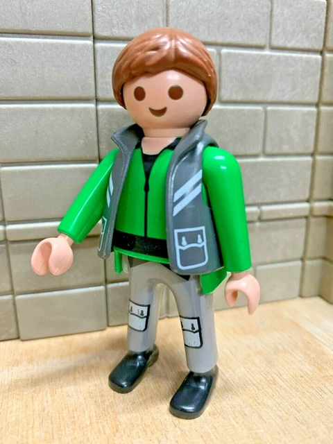 Figurine PLAYMOBIL Aventurier Avec T-shirt Vert - Thème Explorateur à Moto Dinos - Occasion