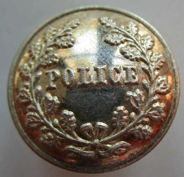 Bouton bombé en métal argenté: "POLICE" entre 2 rameaux de 23 mm, grande qualité