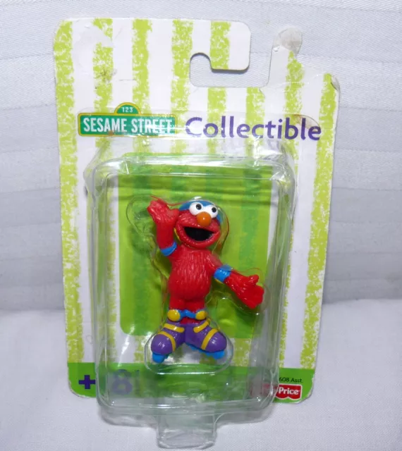 Fisher Price Sesame Street ELMO Collectible Figure Hockey Player 2 1/2" Baby Toy